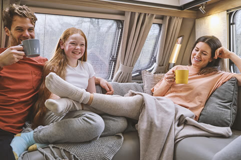 Family in a Swift caravan