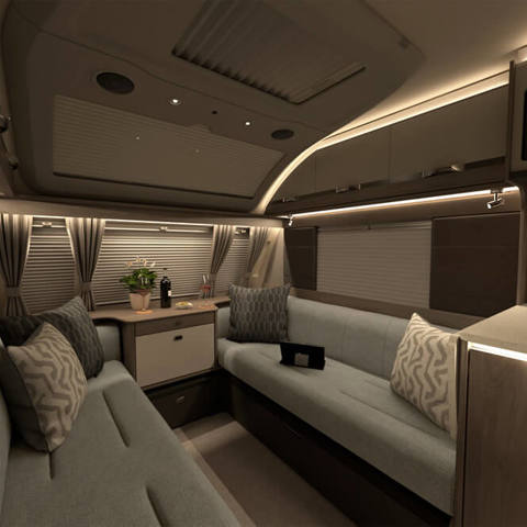 Conqueror 480 lounge at night (optional Iron furnishing)