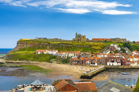 Whitby Abbey overlooking the historic fishing port of Whitby