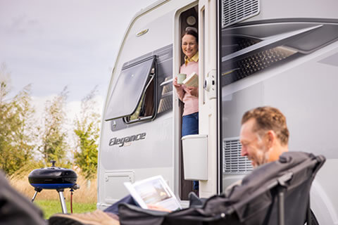A couple relaxing on a touring trip
