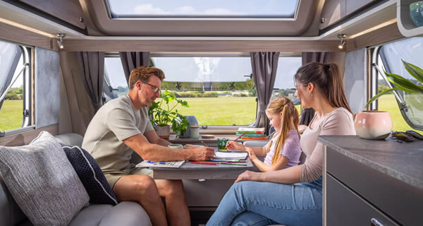 Family sat at the table in a Challenger 580